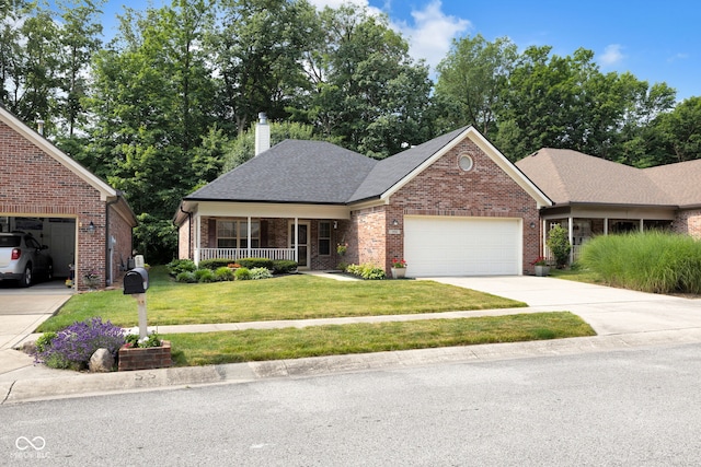 9735 Woodsong Ln, Indianapolis, IN 46229 - view of front of house with covered porch, an attached garage, brick siding, a front yard, and concrete driveway