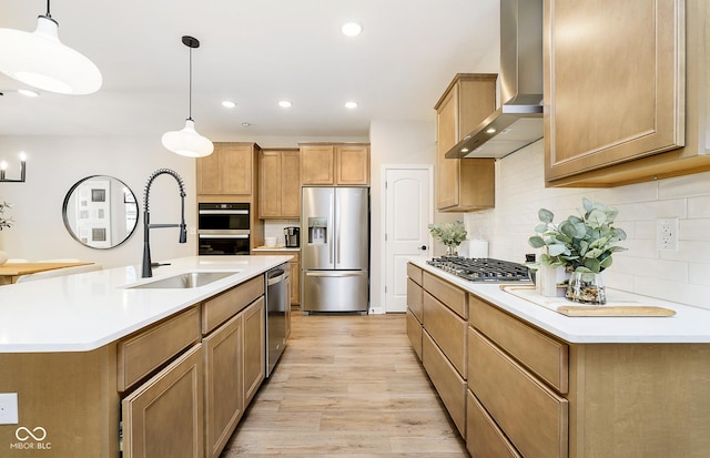 9737 Oleander Dr, Fishers, IN 46250 - kitchen with appliances with stainless steel finishes, wall chimney exhaust hood, light wood-type flooring, backsplash, and pendant lighting