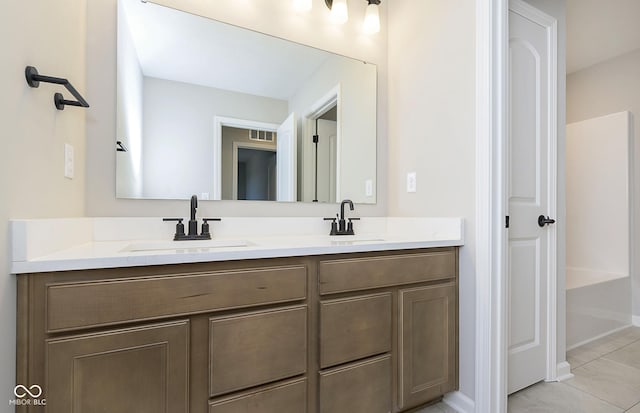 9737 Oleander Dr, Fishers, IN 46250 - full bathroom with double vanity and tile patterned flooring