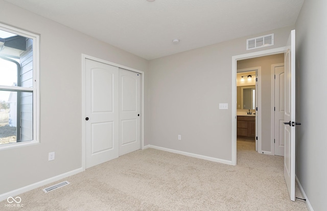 9737 Oleander Dr, Fishers, IN 46250 - unfurnished bedroom with light carpet and a closet
