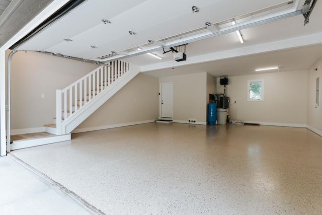 14407 Bryn Mawr Dr, Fishers, IN 46038 - garage with a garage door opener and baseboards