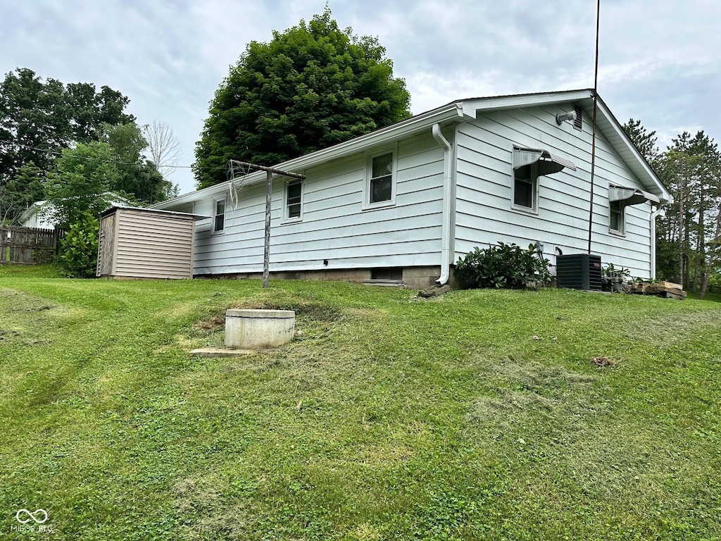 1165 Freeman Rd, Spencer, IN 47460 - back of property featuring a lawn