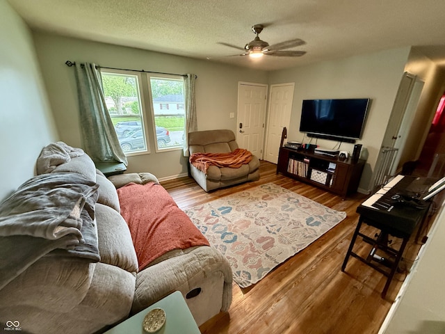 1816 Hemlock Ln, Plainfield, IN 46168 - living room with a ceiling fan and wood finished floors
