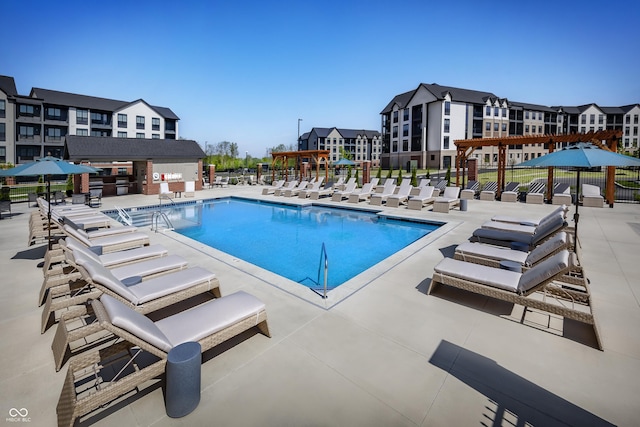 9751 Behner Dr, Fishers, IN 46250 - community pool featuring a patio