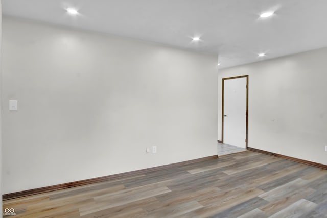 168 Midway Ct S, Hope, IN 47246 - spare room with light wood finished floors and recessed lighting