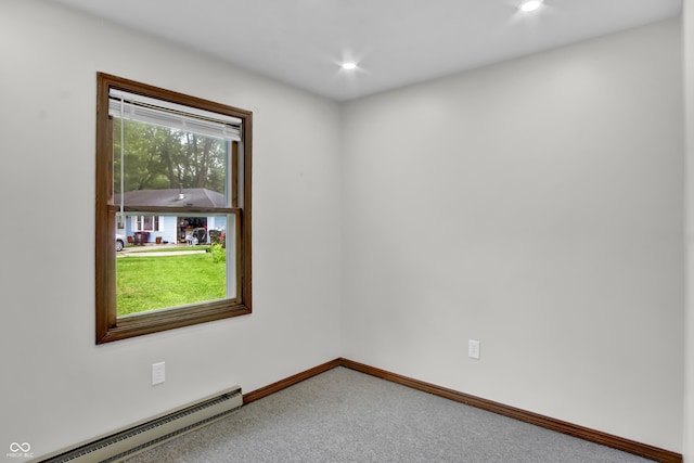 168 Midway Ct S, Hope, IN 47246 - carpeted empty room with a baseboard heating unit and recessed lighting