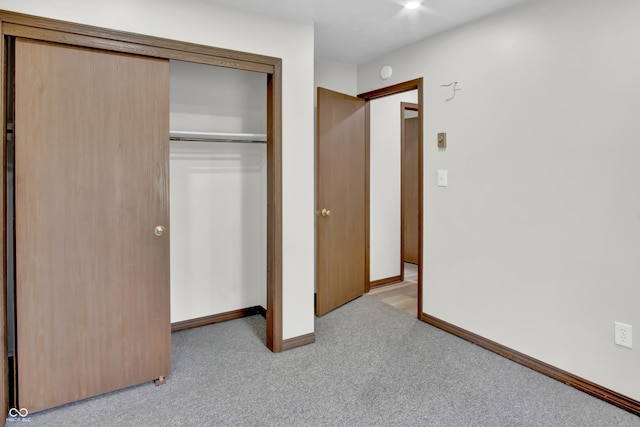 168 Midway Ct S, Hope, IN 47246 - unfurnished bedroom with carpet flooring and a closet
