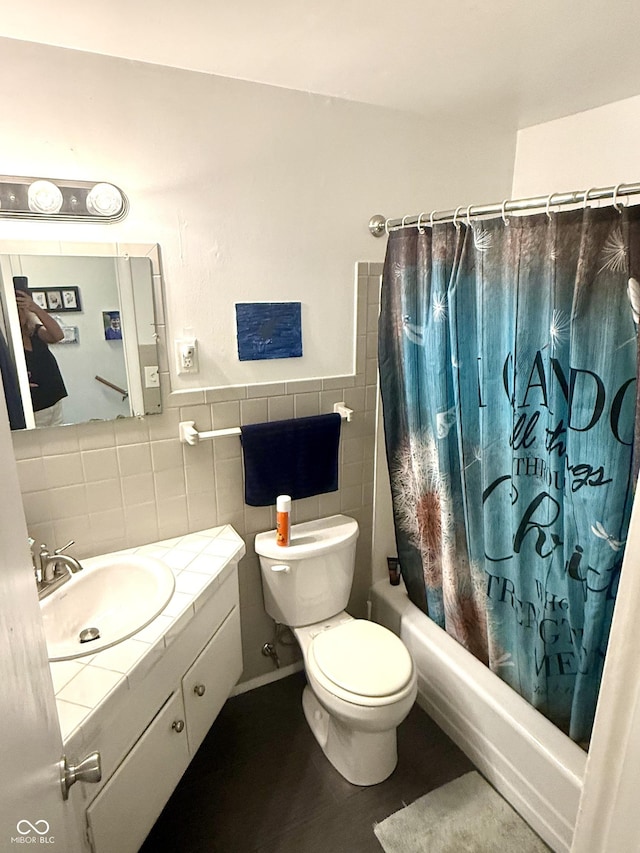 2615 Alexandria Pike, Anderson, IN 46012 - bathroom featuring vanity, shower / tub combo with curtain, and tile walls
