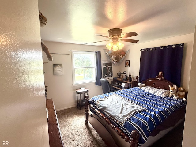 2615 Alexandria Pike, Anderson, IN 46012 - carpeted bedroom featuring a ceiling fan and baseboards