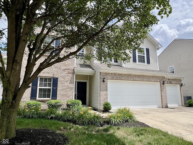 13859 Keams Dr, Fishers, IN 46038 - view of front of home featuring a garage, driveway, brick siding, and a shingled roof