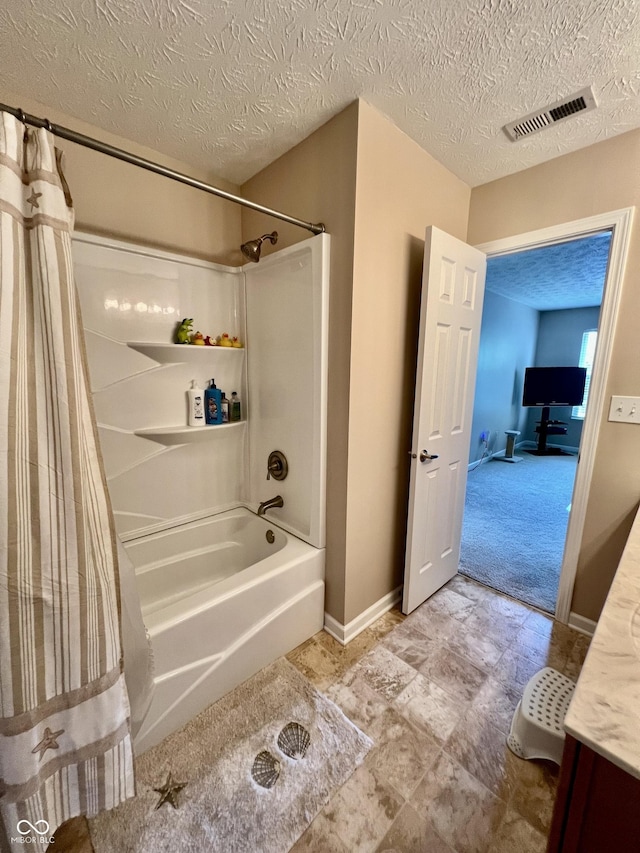 13859 Keams Dr, Fishers, IN 46038 - bathroom featuring shower / bath combo, vanity, and a textured ceiling
