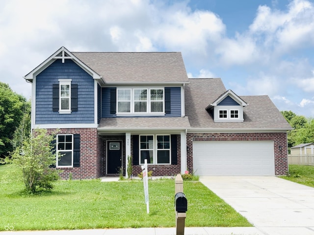 980 S Raylee Garden Dr, New Palestine, IN 46163 - view of front facade featuring a front lawn, brick siding, driveway, a garage, and a shingled roof