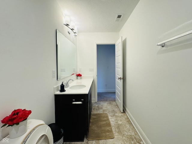 980 S Raylee Garden Dr, New Palestine, IN 46163 - bathroom featuring vanity and a textured ceiling
