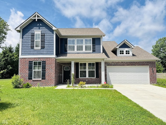 980 S Raylee Garden Dr, New Palestine, IN 46163 - view of front facade featuring brick siding, driveway, an attached garage, a front lawn, and roof with shingles