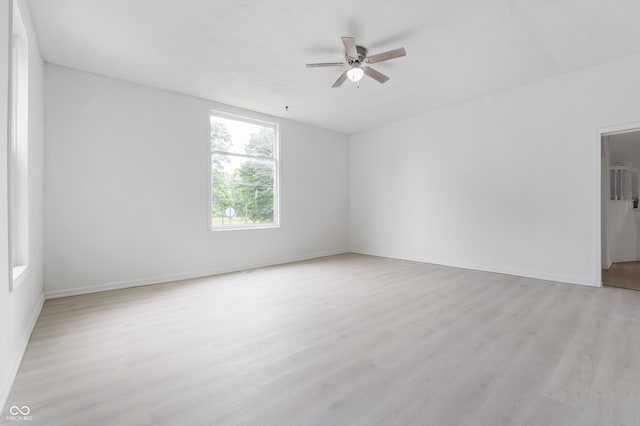 321 W Broad St, Spiceland, IN 47385 - unfurnished room featuring light wood finished floors and ceiling fan
