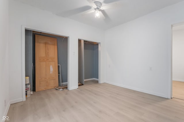 321 W Broad St, Spiceland, IN 47385 - unfurnished bedroom featuring light wood-style floors and a ceiling fan