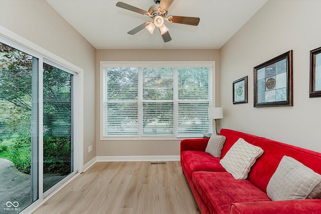 11074 Galley Way, Fishers, IN 46040 - living area with light wood finished floors and ceiling fan