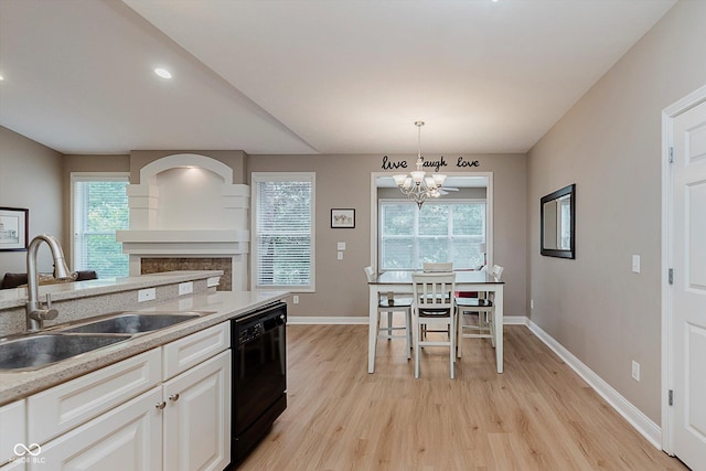 11074 Galley Way, Fishers, IN 46040 - kitchen featuring black dishwasher, light wood finished floors, pendant lighting, plenty of natural light, and recessed lighting