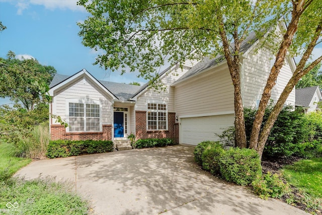 11074 Galley Way, Fishers, IN 46040 - view of front of property featuring brick siding, concrete driveway, and a shingled roof