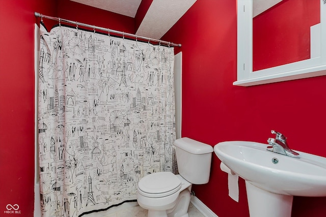 11074 Galley Way, Fishers, IN 46040 - bathroom featuring curtained shower, a textured ceiling, and tile patterned flooring
