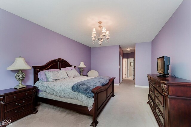 11074 Galley Way, Fishers, IN 46040 - bedroom featuring a chandelier and light carpet