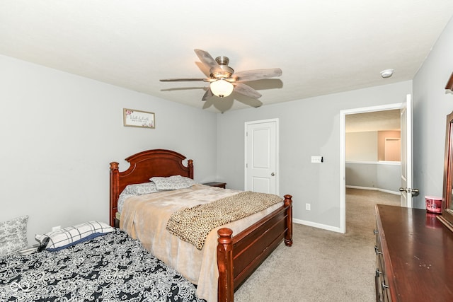 9053 Fitzgerald Dr, Indianapolis, IN 46239 - bedroom featuring light carpet and ceiling fan