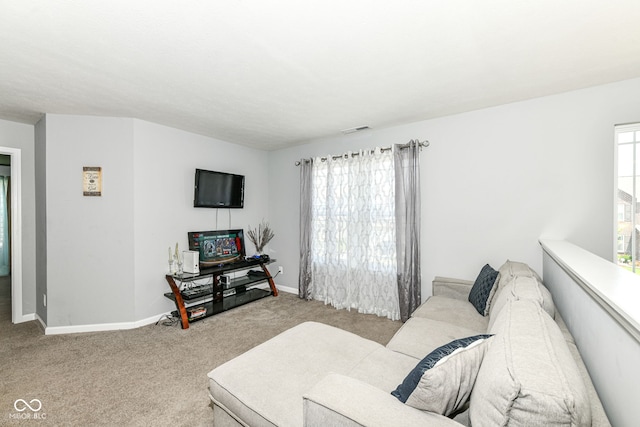 9053 Fitzgerald Dr, Indianapolis, IN 46239 - carpeted living area with baseboards