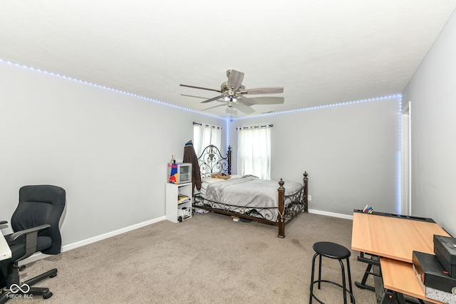 9053 Fitzgerald Dr, Indianapolis, IN 46239 - carpeted bedroom with a desk and a ceiling fan