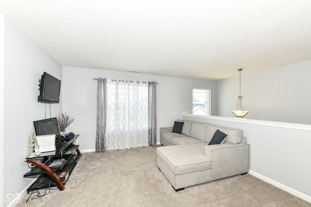 9053 Fitzgerald Dr, Indianapolis, IN 46239 - carpeted living area with baseboards