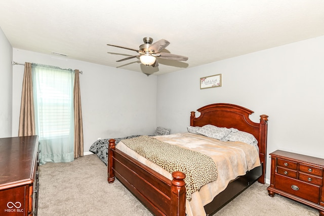 9053 Fitzgerald Dr, Indianapolis, IN 46239 - bedroom featuring light carpet and ceiling fan