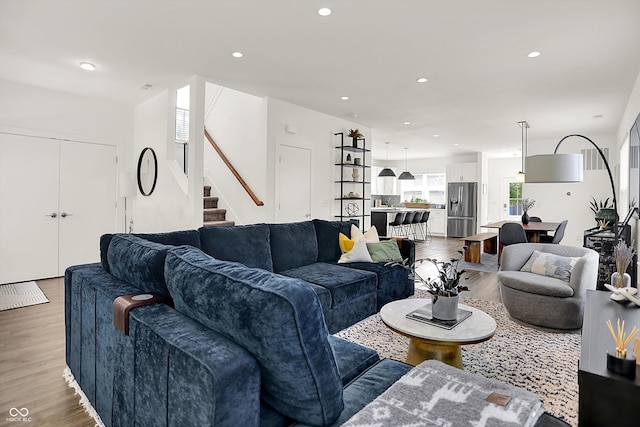 2720 Guilford Ave, Indianapolis, IN 46205 - living area featuring wood finished floors, stairs, and recessed lighting