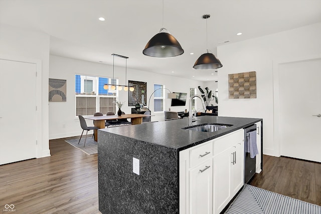 2720 Guilford Ave, Indianapolis, IN 46205 - kitchen featuring dark wood-style floors, dishwasher, a kitchen island with sink, recessed lighting, and decorative light fixtures