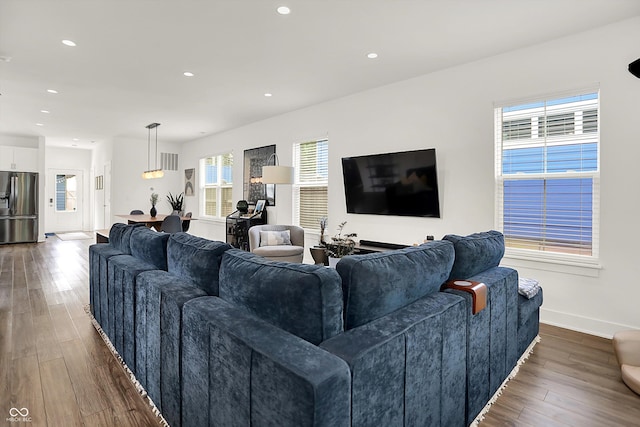 2720 Guilford Ave, Indianapolis, IN 46205 - living room featuring dark wood-type flooring and recessed lighting