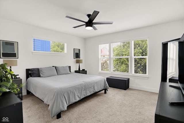 2720 Guilford Ave, Indianapolis, IN 46205 - carpeted bedroom featuring baseboards and a ceiling fan