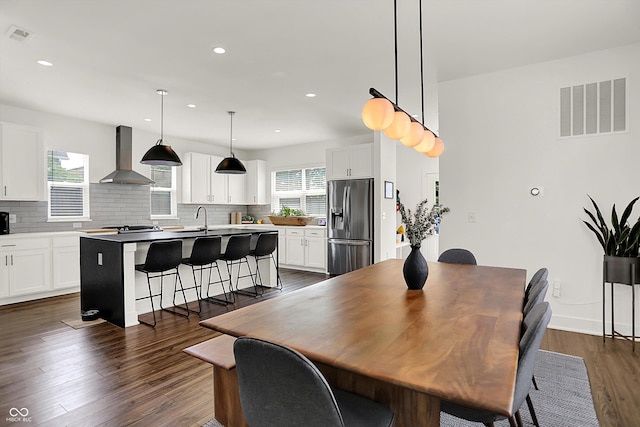 2720 Guilford Ave, Indianapolis, IN 46205 - dining room with dark wood-style flooring and recessed lighting