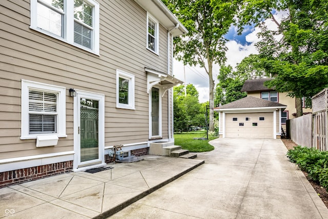 4904 N Washington Blvd, Indianapolis, IN 46205 - view of patio featuring an outdoor structure and a garage
