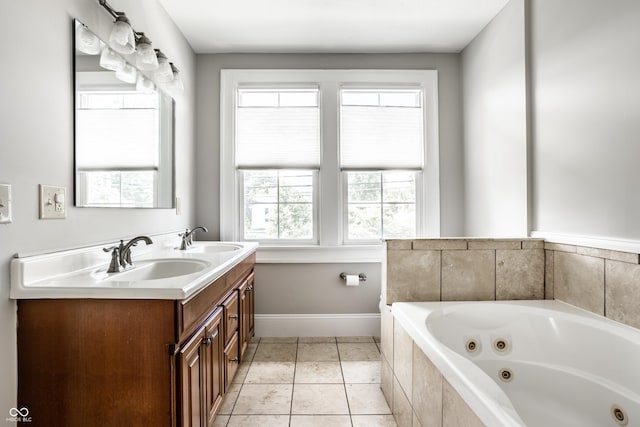 4904 N Washington Blvd, Indianapolis, IN 46205 - full bath featuring double vanity, a whirlpool tub, and tile patterned flooring