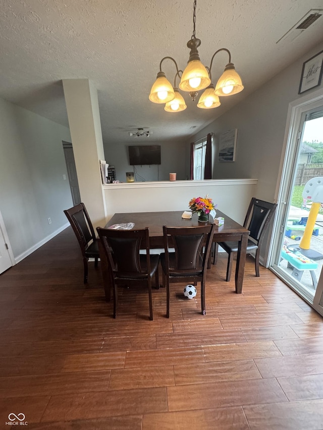 6027 Moonseed Cir, Indianapolis, IN 46203 - dining area with wood finished floors and a textured ceiling