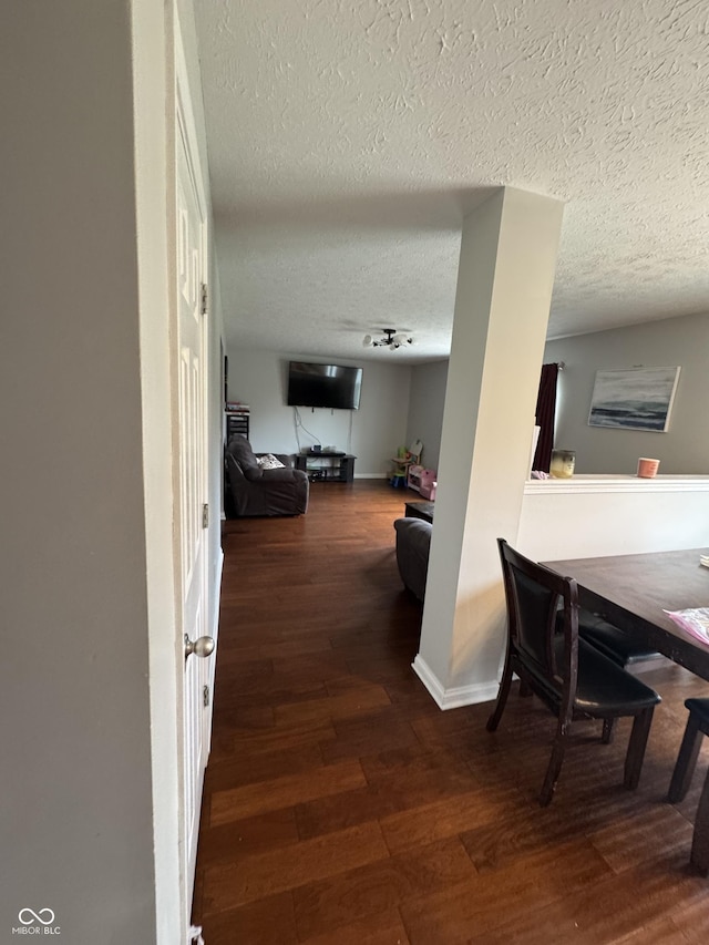 6027 Moonseed Cir, Indianapolis, IN 46203 - corridor featuring wood finished floors and a textured ceiling