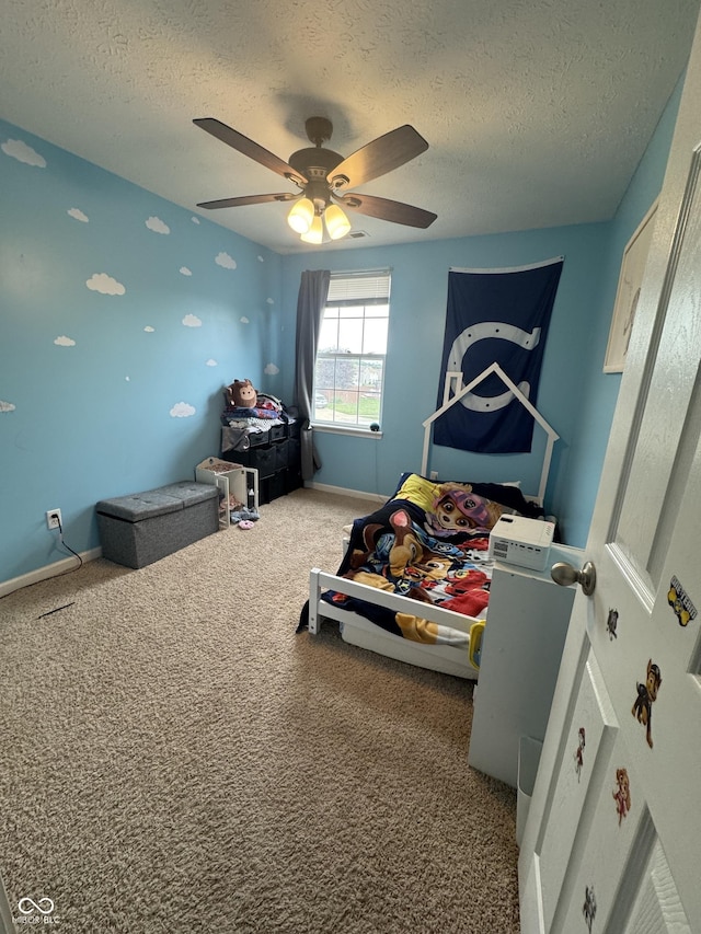 6027 Moonseed Cir, Indianapolis, IN 46203 - bedroom with a textured ceiling, carpet flooring, and ceiling fan