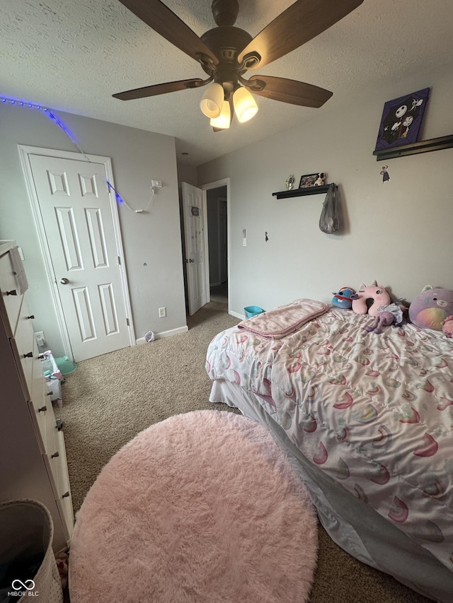 6027 Moonseed Cir, Indianapolis, IN 46203 - carpeted bedroom featuring a ceiling fan and a textured ceiling