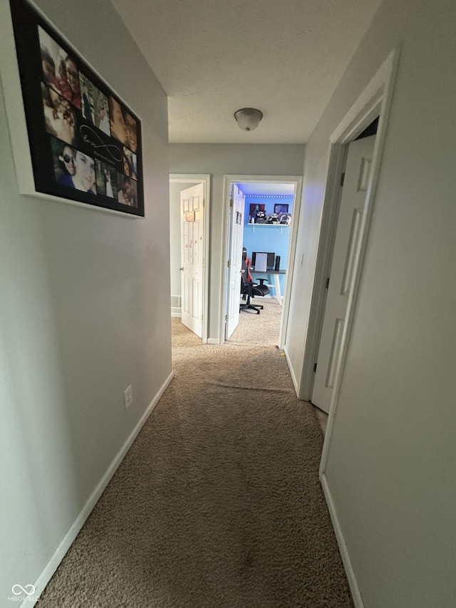6027 Moonseed Cir, Indianapolis, IN 46203 - corridor with carpet flooring and an office area
