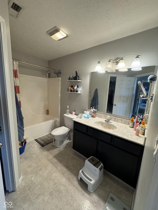 6027 Moonseed Cir, Indianapolis, IN 46203 - bathroom with vanity, shower / tub combo, tile patterned flooring, and a textured ceiling