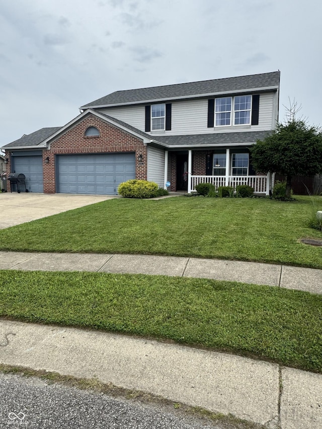 6027 Moonseed Cir, Indianapolis, IN 46203 - traditional-style house with a porch, an attached garage, brick siding, a front yard, and concrete driveway