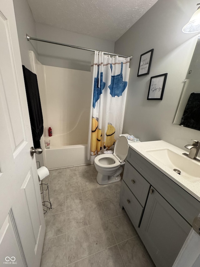 6027 Moonseed Cir, Indianapolis, IN 46203 - bathroom featuring vanity, shower / tub combo with curtain, a textured ceiling, and tile patterned floors
