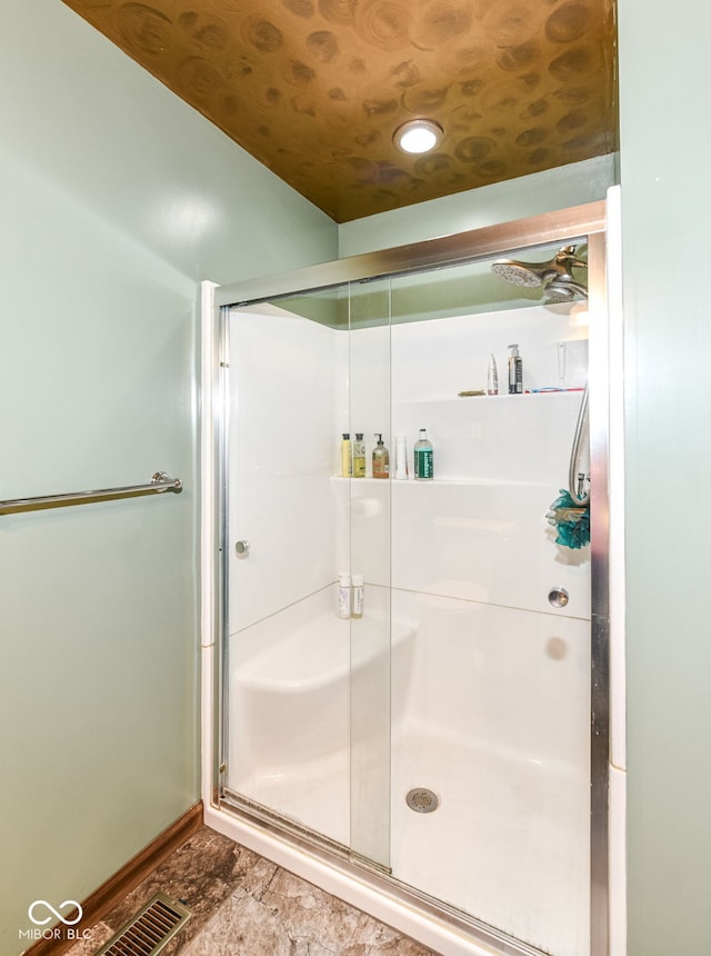 1624 Riley Rd, Lebanon, IN 46052 - bathroom featuring a stall shower and baseboards