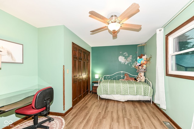 1624 Riley Rd, Lebanon, IN 46052 - bedroom featuring wood finished floors, an office area, a closet, and a ceiling fan
