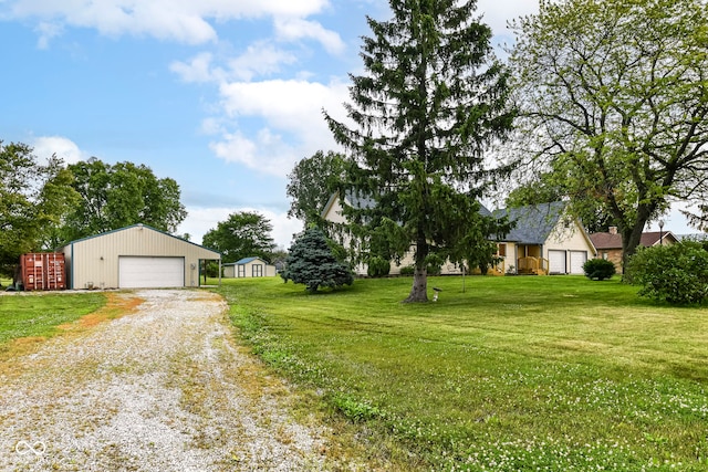 1624 Riley Rd, Lebanon, IN 46052 - view of grassy yard with an outdoor structure and a detached garage