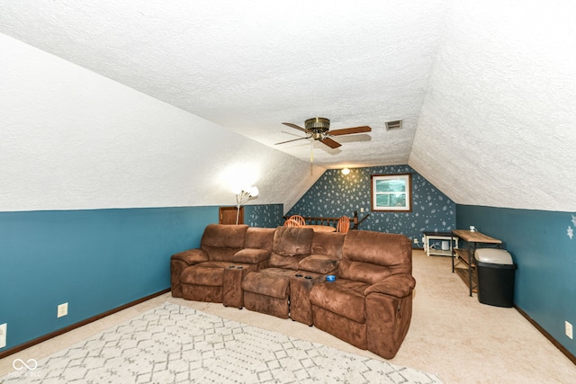 1624 Riley Rd, Lebanon, IN 46052 - carpeted cinema featuring a textured ceiling, vaulted ceiling, and a ceiling fan