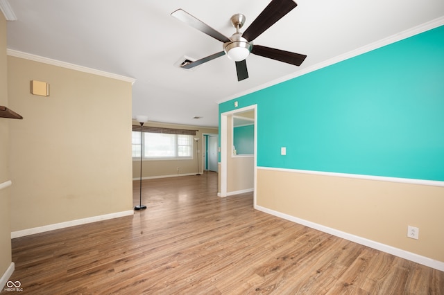 10500 S County Road 200 W, Muncie, IN 47302 - unfurnished room with crown molding, wood finished floors, and ceiling fan